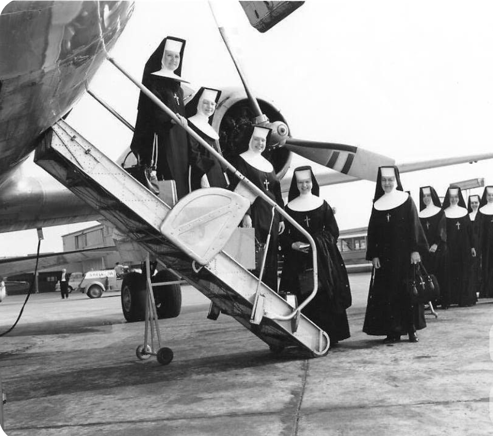 Sisters boarding a plane
